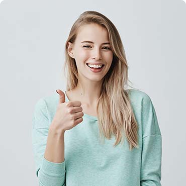A girl in a light green shirt is Showing her satisfactory thumbs-up small business Accountants
